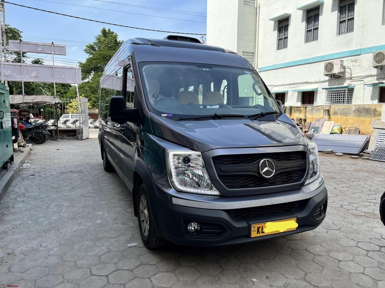Dark grey passenger van front view